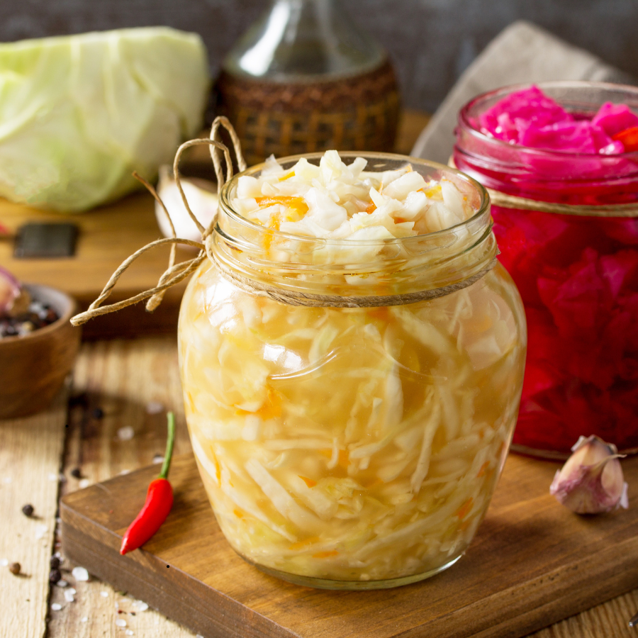 Easy homemade sauerkraut in jar on board